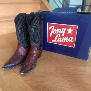 Tony lama cowboy boots. Barely worn. Black top. Brown bottom.